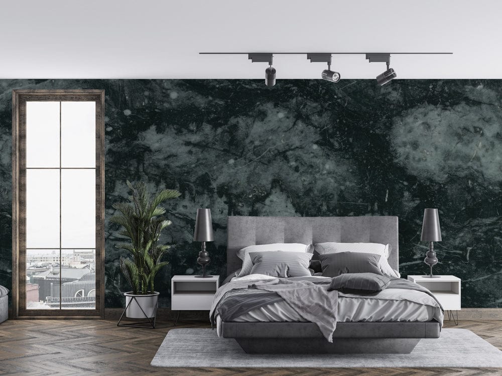 Elegant dark marble effect wallpaper in a modern bedroom with grey bed, wood flooring, textured decor.