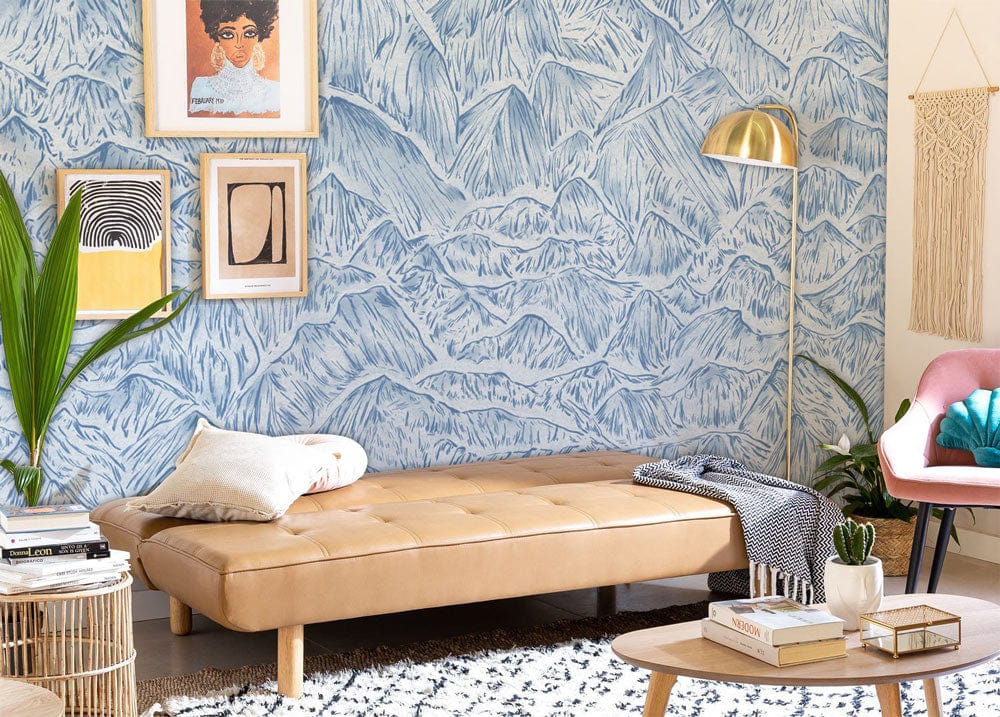 Tranquil Blue Mountain Mural Wallpaper, leather sofa, contemporary decor, beige rug, modern living room.