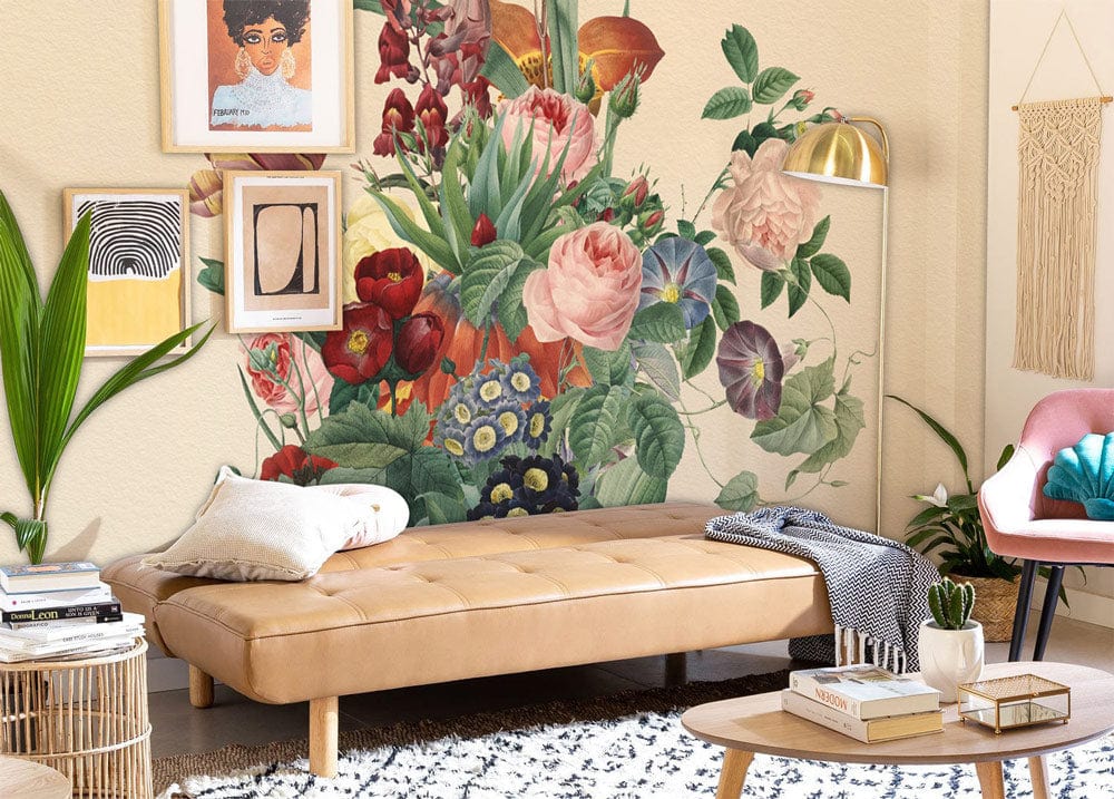 Vintage botanical floral wallpaper with pastel blooms, tan sofa, modern living room decor, cream walls.