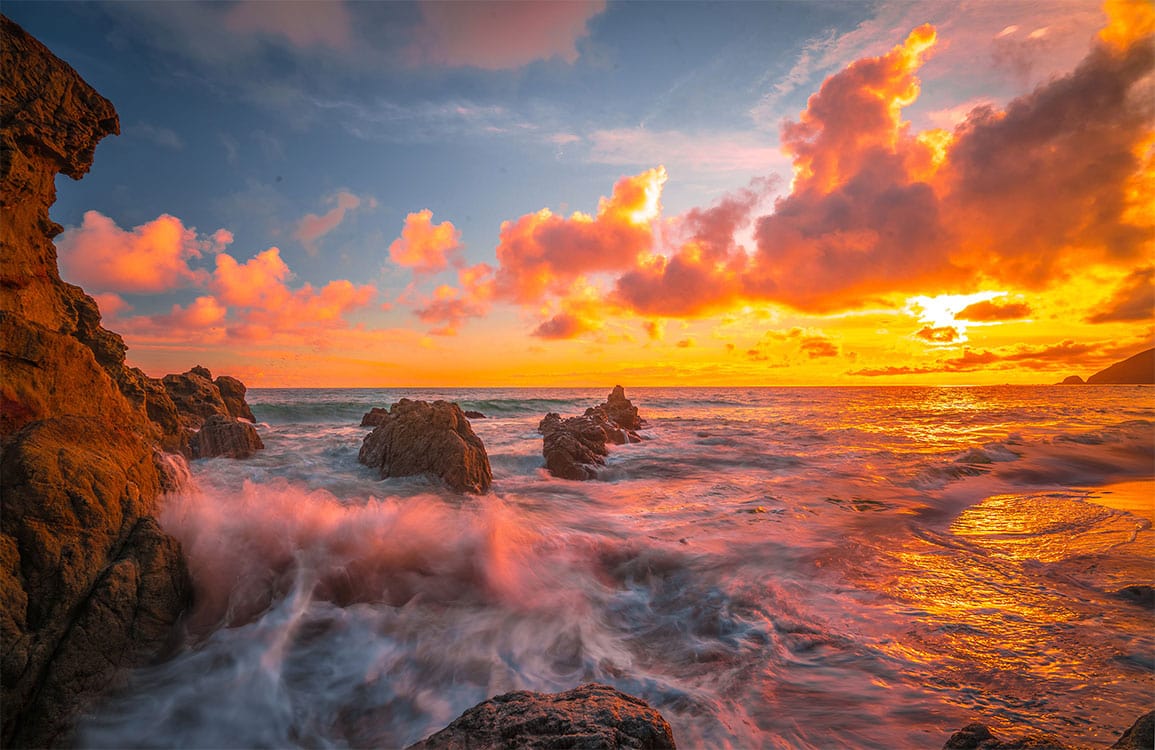 Vibrant Sunset Seascape Mural Wallpaper - Dramatic Coastal Colours and Waves