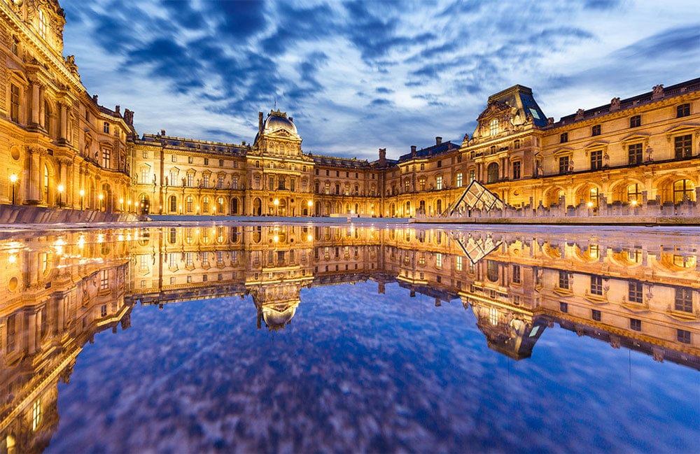 Majestic Evening Paris Architecture Mural Wallpaper in Blue and Gold Hues