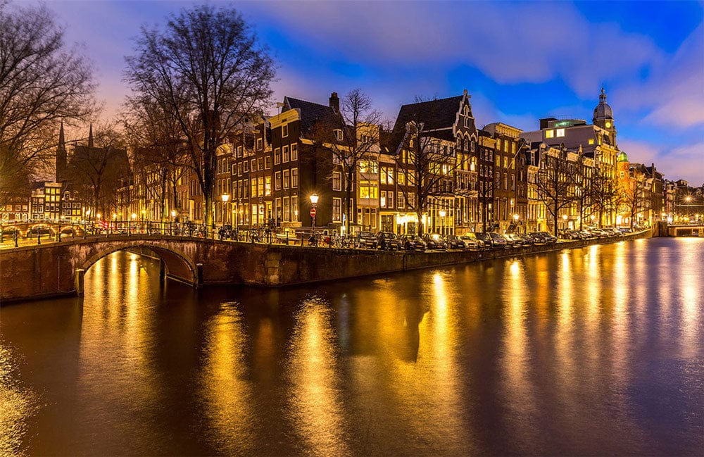 Amsterdam Canal Evening Glow Mural Wallpaper - Warm Urban Landscape Design