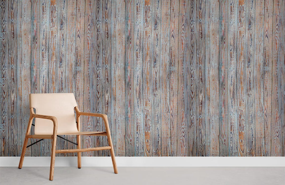 Rustic mural wallpaper in grey and brown tones, paired with a beige wooden chair on carpet.