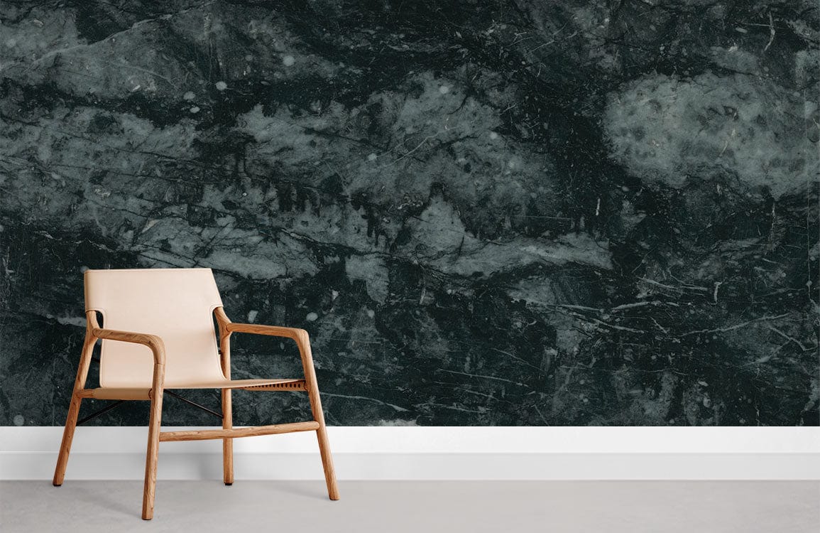 Elegant dark marble-effect wallpaper, textured charcoal stone pattern, beige chair, grey floor, modern room.