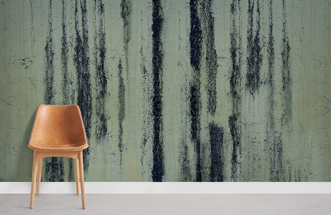 Rustic Charcoal Drip Wallpaper with tan chair, grey floor, textured vintage-style decor in room setting.