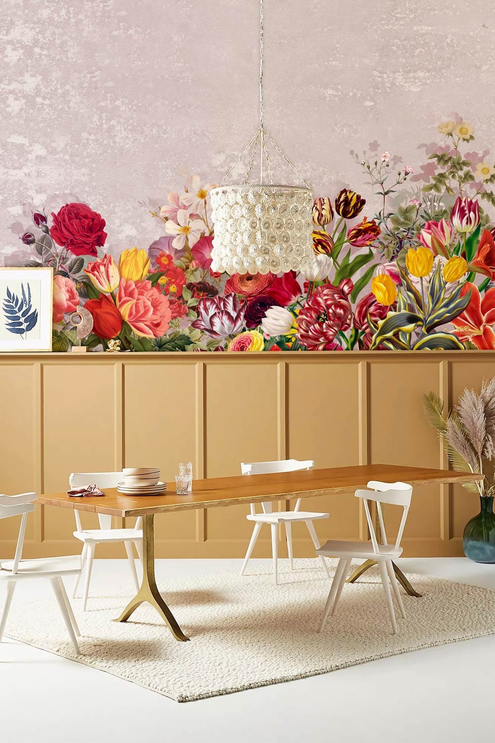 Vintage Floral Mural Wallpaper with vibrant flowers, wooden dining table, white chairs, beige rug, chandelier.