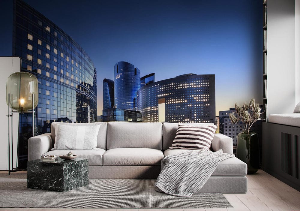Modern Blue Skyline Cityscape Mural Wallpaper, grey sofa, contemporary interior, marble coffee table, rug.