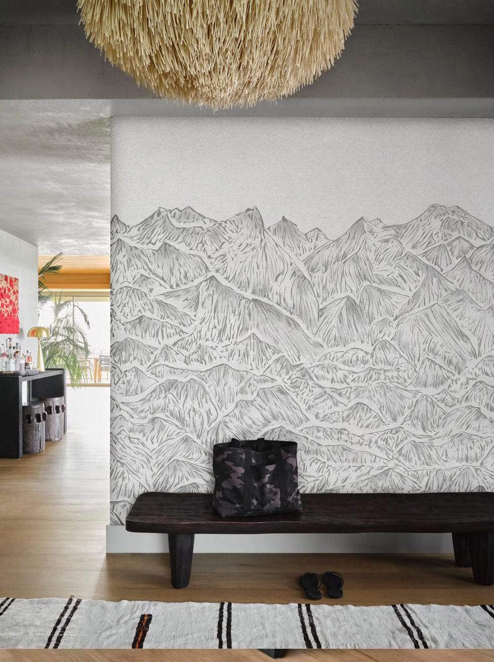 Grey Mountain Sketch Wallpaper Mural, elegant home Décor with wooden bench, hanging decor, stylish interior.