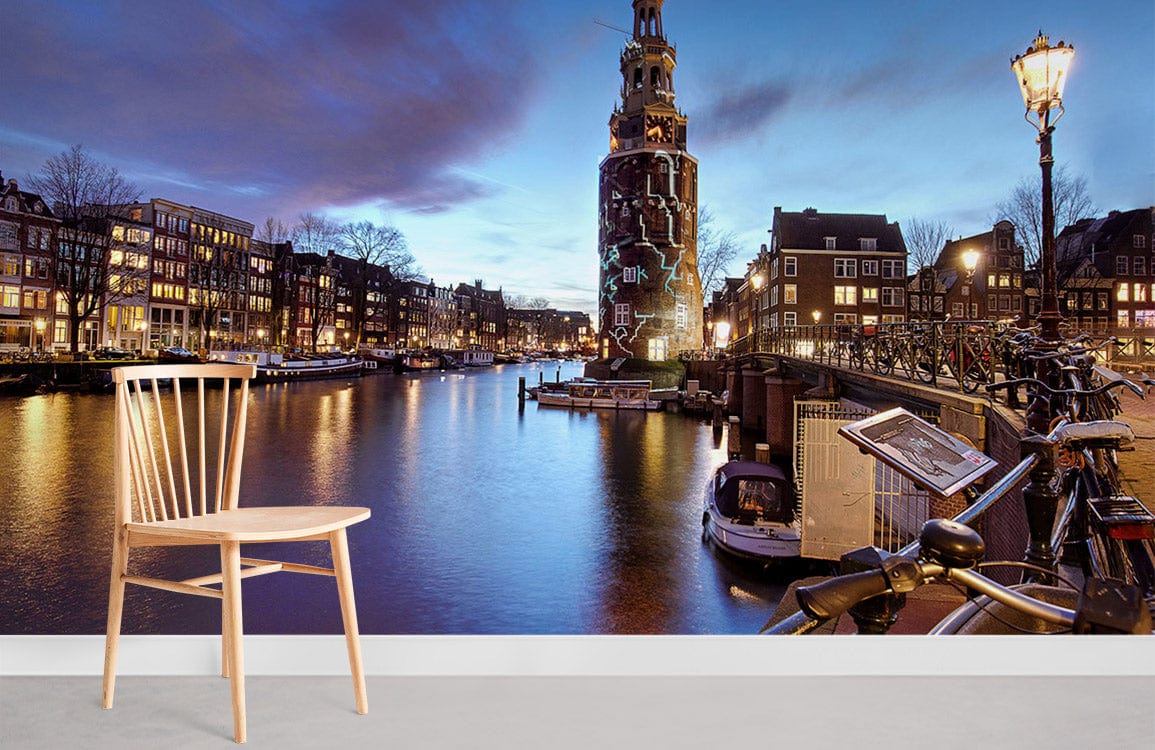 Amsterdam Canal Evening Glow Mural Wallpaper, scenic elegance with wooden chair, light grey flooring.