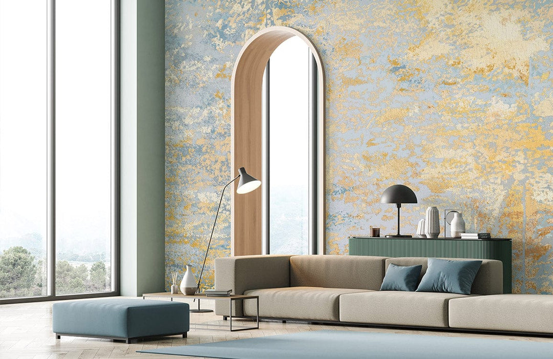 Serenity Dreamscape mural with textured blue-gold design; elegant living room sofa and modern decor elements.