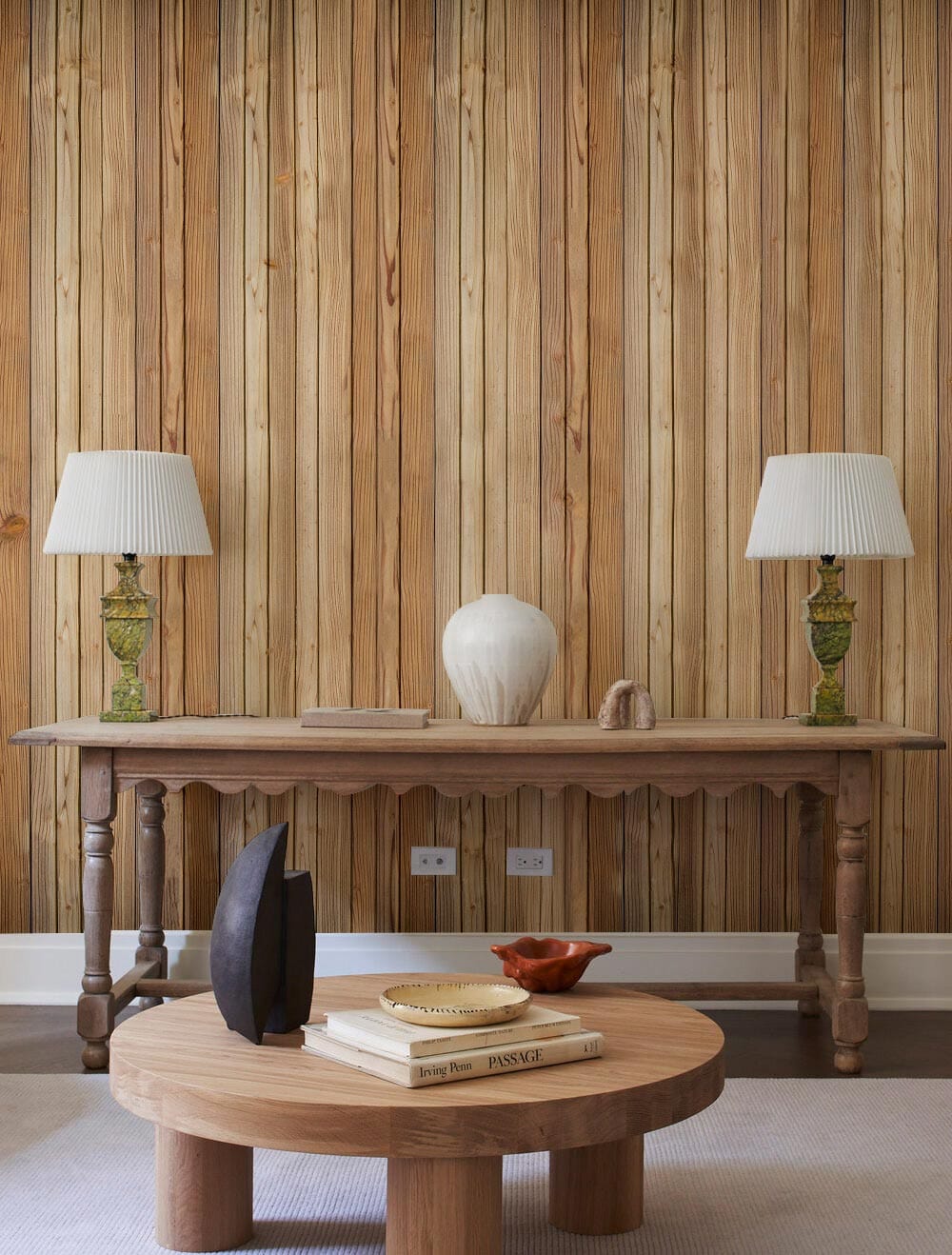 Natural brown wood plank effect wallpaper in room with wooden table, round coffee table, stylish decor.