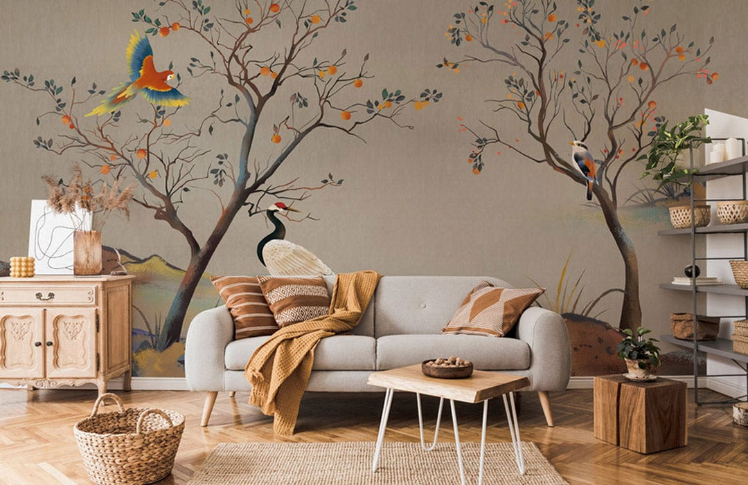 Elegant mural wallpaper with tropical birds, earthy tones; grey sofa, natural wood furniture, herringbone floor.