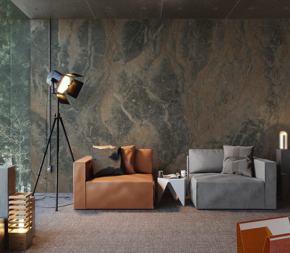 Natural stone effect wallpaper, grey sofa, brown leather chair, modern lamp, earthy tones, textured walls.