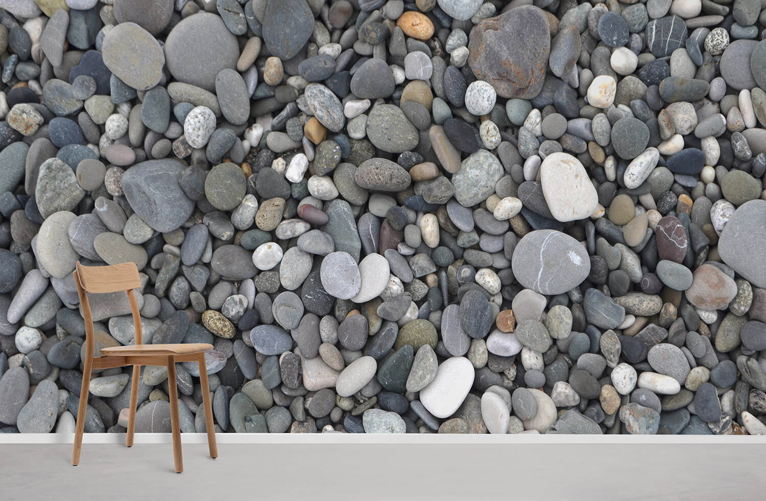 Natural Pebble Stones Grey Wallpaper, wooden chair, white skirting, neutral flooring in modern living room.