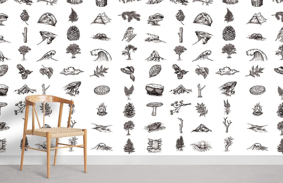 Monochrome vintage wilderness sketch wallpaper in minimalist room, featuring natural wooden chair on grey floor.