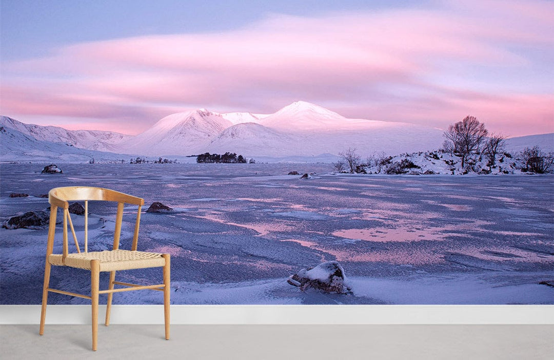 Tranquil pink and blue mountain landscape mural, wooden chair, white wall, grey floor in living room.