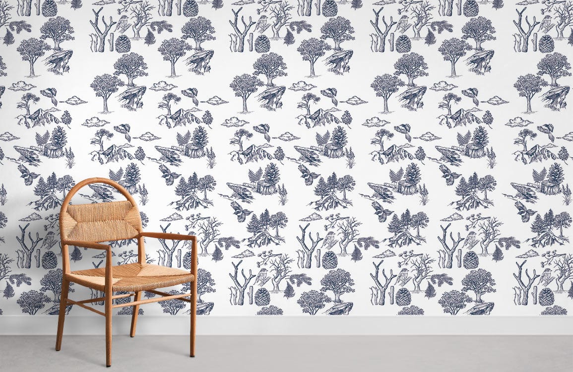 Navy and white forest toile pattern wallpaper with wooden chair on light grey flooring, room decor.
