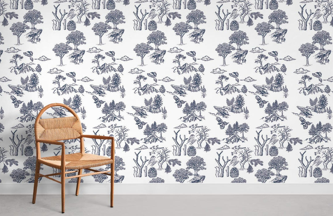 Navy and white forest toile pattern wallpaper with wooden chair on light grey flooring, room decor.
