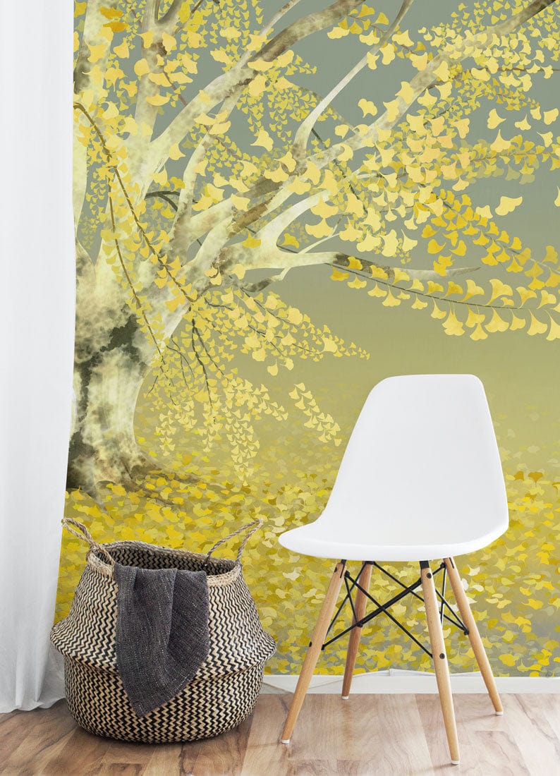 Golden Dreamscape Tree Mural Wallpaper, tranquil yellow-grey, white chair, wooden flooring, woven basket.