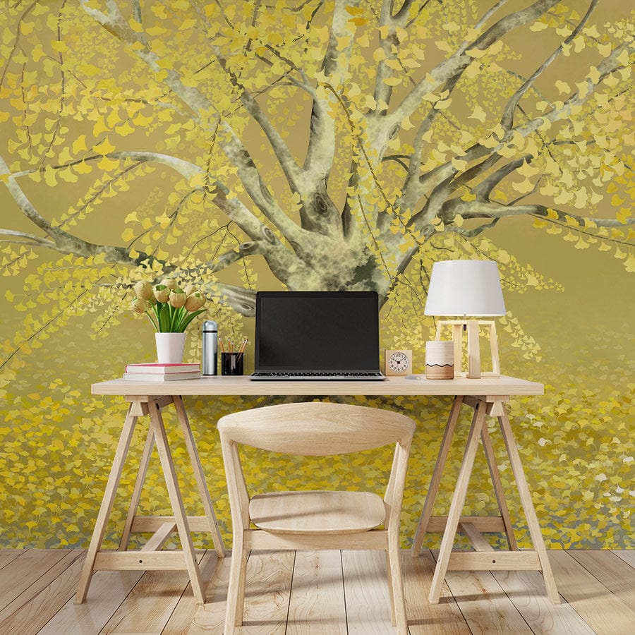 Golden Autumn Tree Mural Wallpaper adorns room with light wood flooring, minimalist desk, and chair.