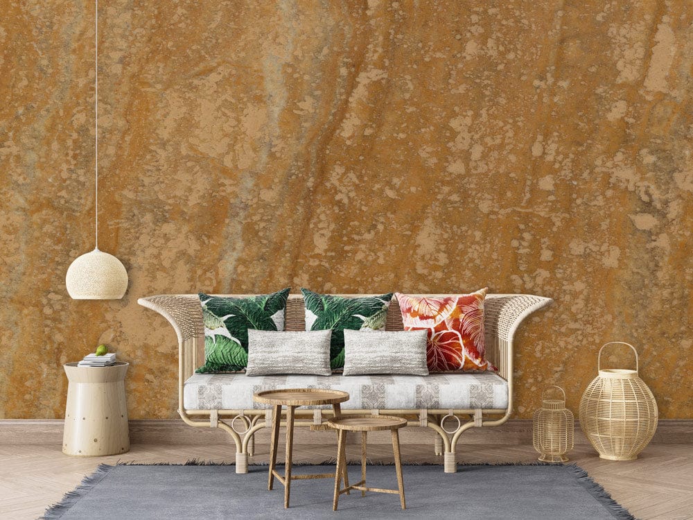 Golden Earth rustic yellow stone wallpaper with wicker sofa, tropical cushions, and light wooden flooring.