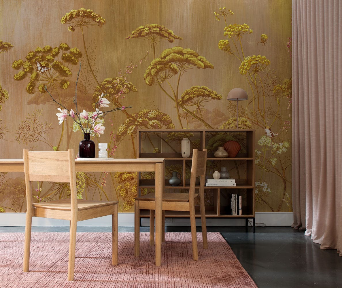Golden Botanical Meadow Mural Wallpaper, vintage floral design, wooden furniture, pink rug, elegant dining room.