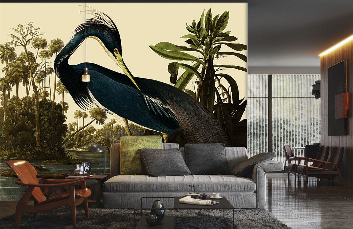 Elegant blue heron mural wallpaper in modern living room with grey sofa and wooden armchairs.