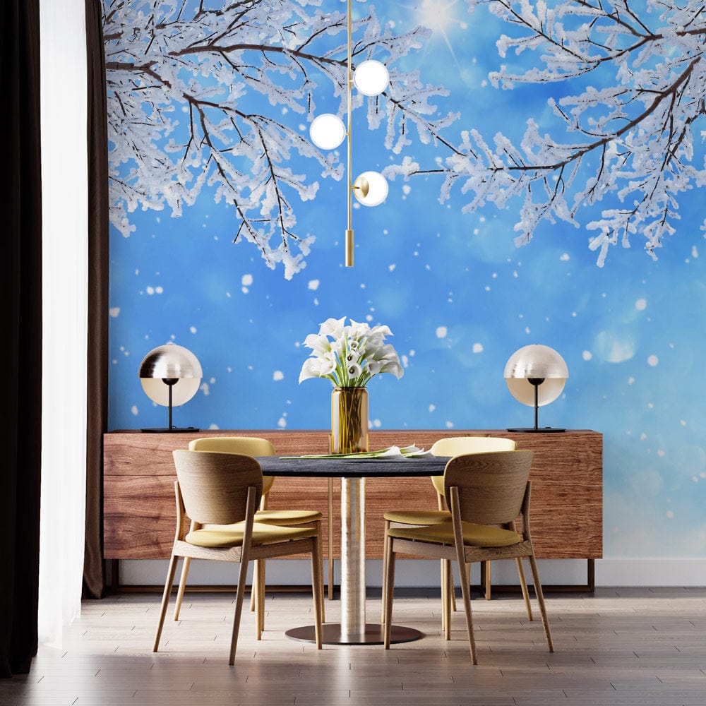 Dining room with Winter Wonderland Snowy Branches wallpaper, wooden sideboard, modern pendant light, and chairs.