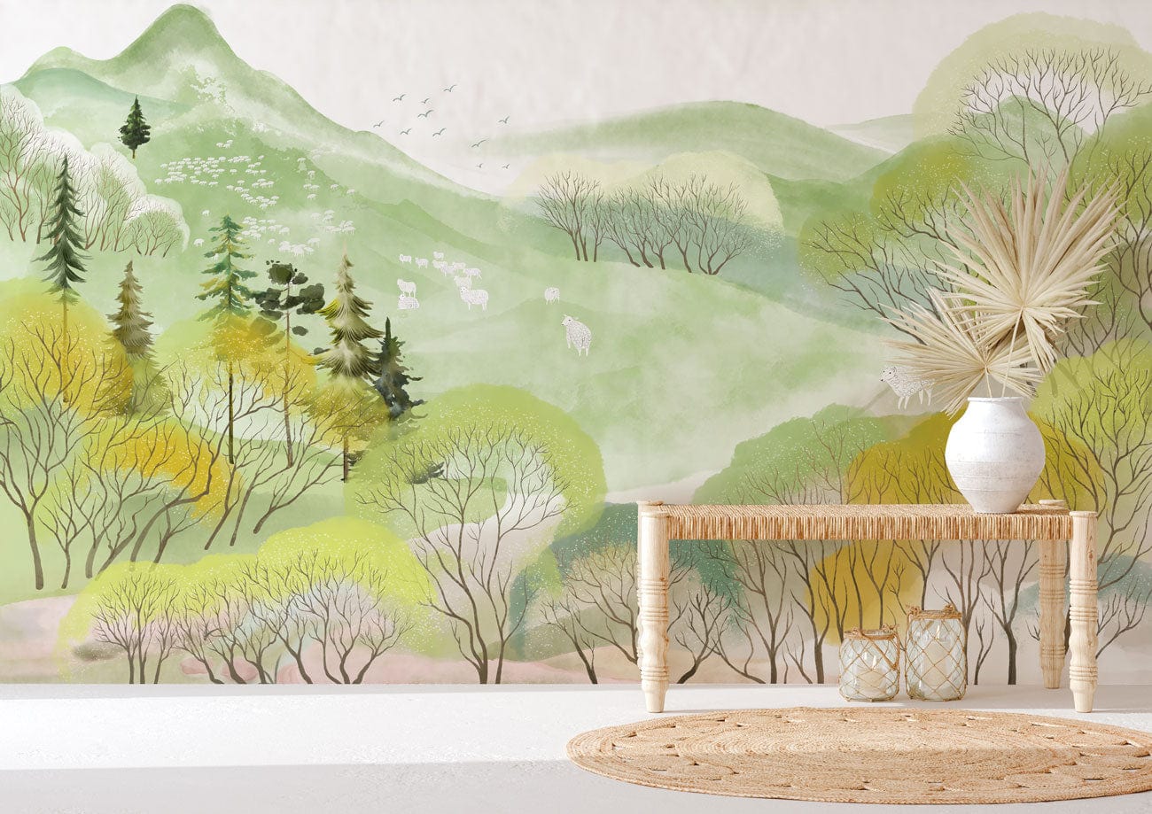 Serene pastel forest landscape mural wallpaper with wicker console, white vase, round rug in living room.