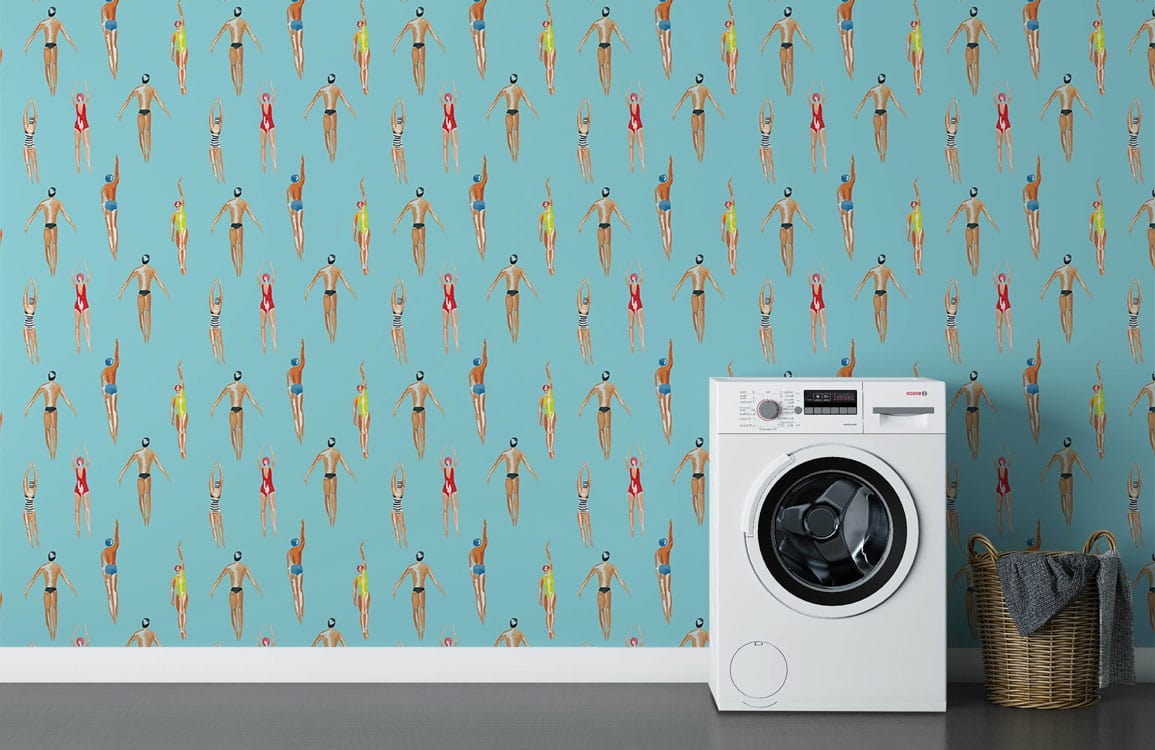 Retro Swimmers wallpaper with aqua blue, beach decor, washing machine, grey flooring, laundry room style.