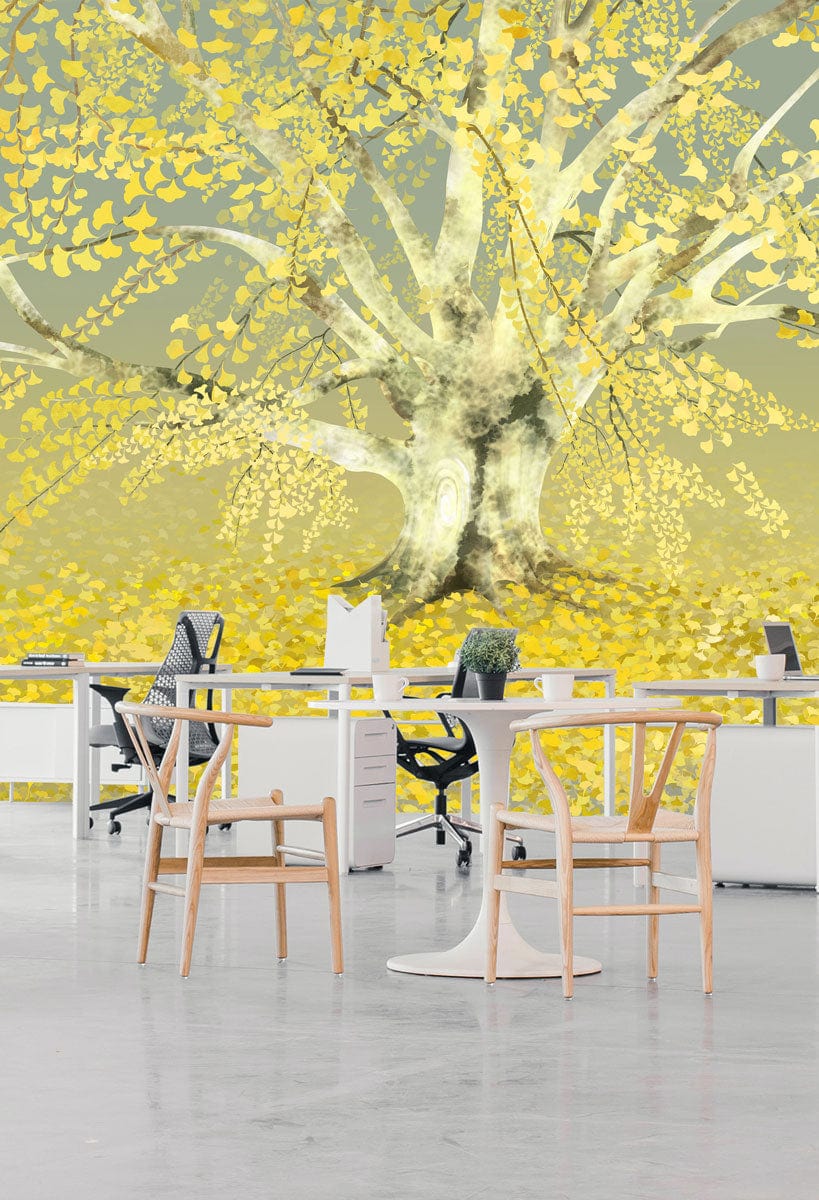 Golden Dreamscape Tree Mural Wallpaper in yellow-grey, office setting, white desks, light wooden chairs.