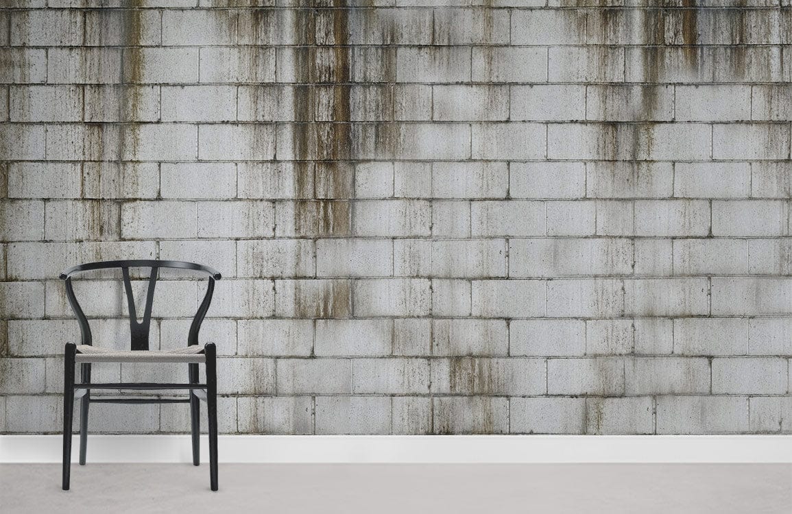 Industrial grey concrete brick wallpaper with black chair, urban loft decor, grey flooring.