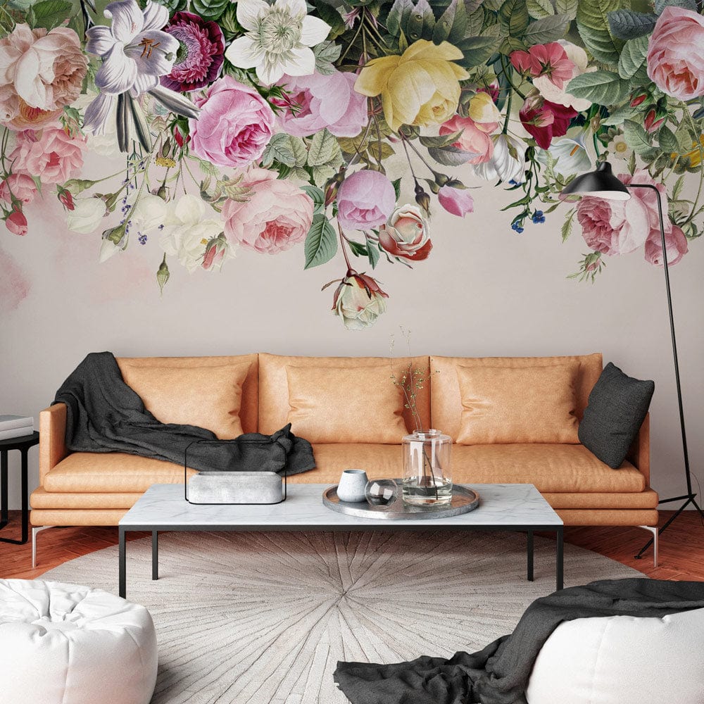 Vintage floral mural wallpaper in pastel hues, beige sofa, grey rug, modern living room decor.