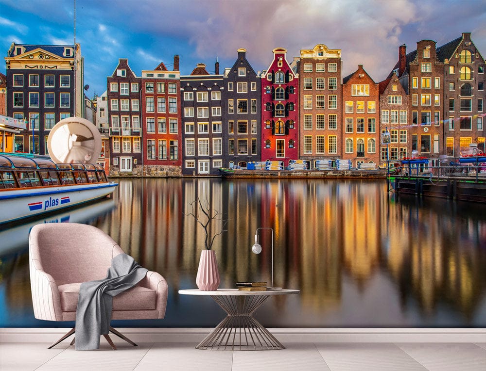 Amsterdam canal houses mural wallpaper, pink modern chair, light tiled flooring, contemporary room, vivid design.