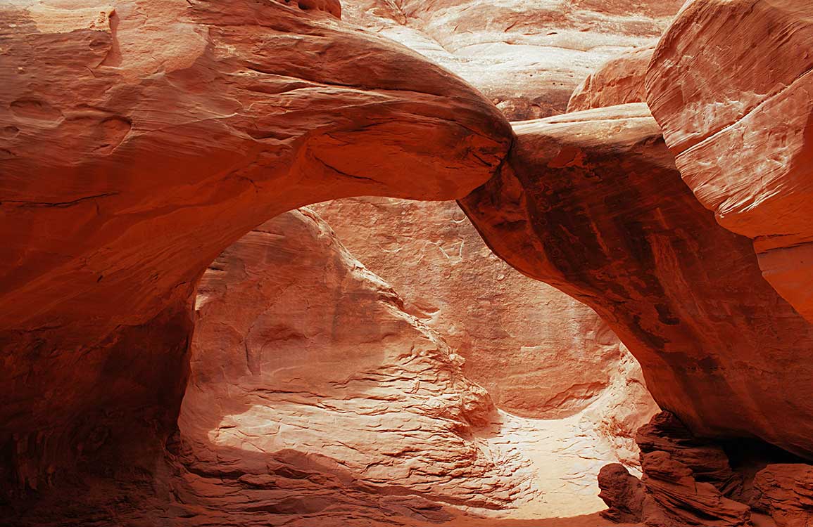 Earthy Canyon Red Stone Mural Wallpaper for Natural Desert Interiors