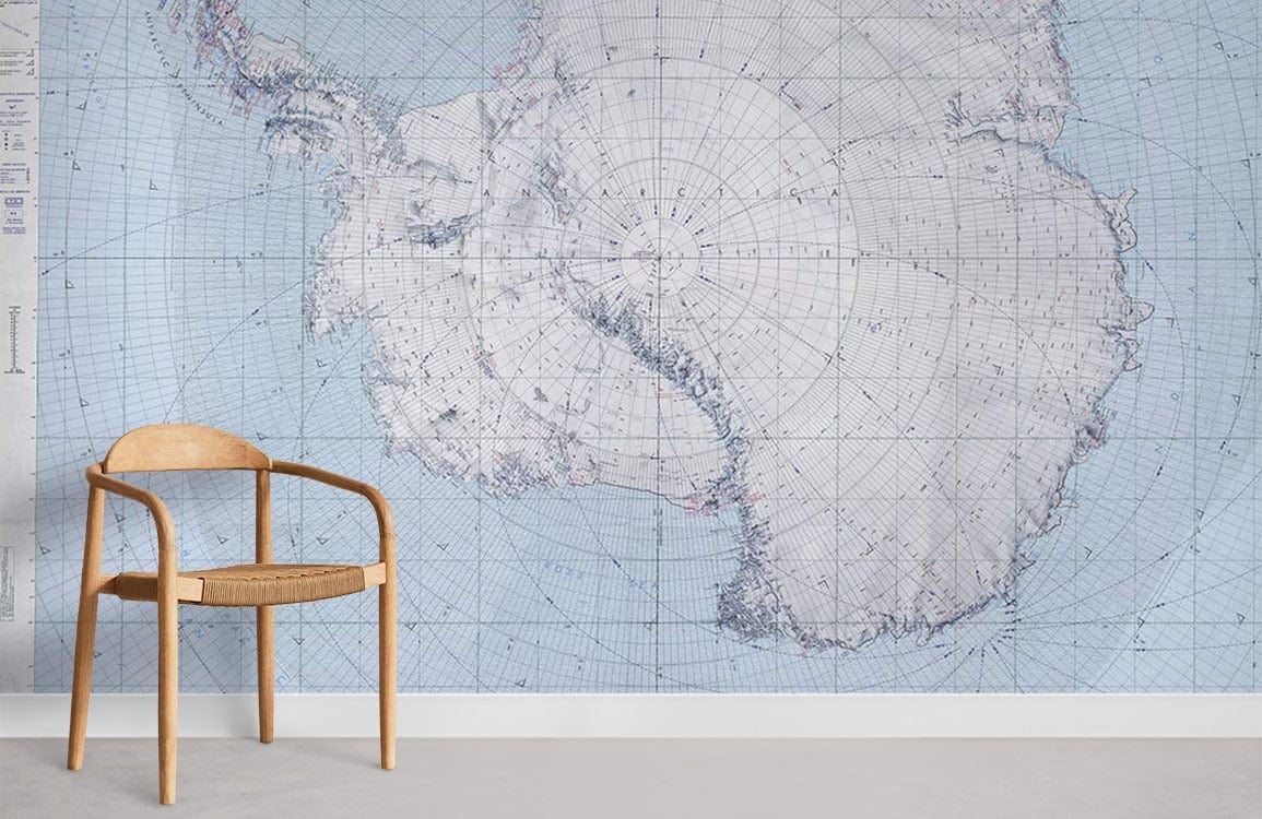 Antarctic Expedition Vintage Map Wallpaper in blue hues, wooden chair, light grey carpet, stylish wall.