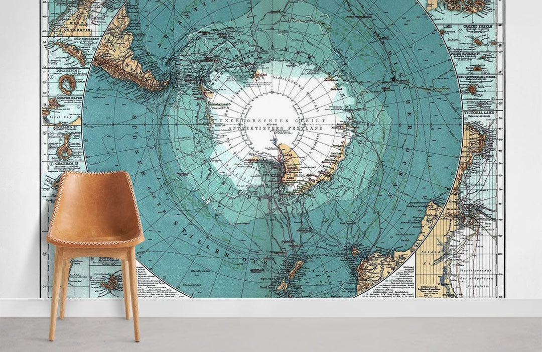 Vintage World Map Aqua Blue Nautical Mural Wallpaper in stylish interior with modern brown chair.