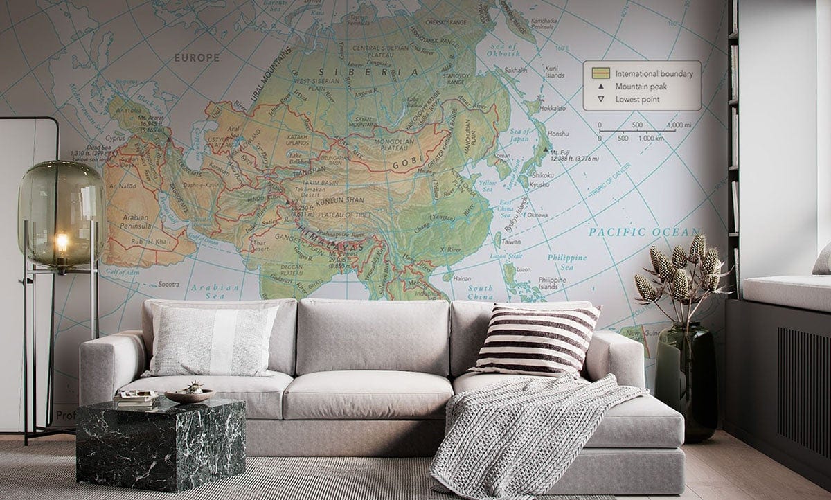 Vintage Asia Pacific Map Mural Wallpaper in study with beige sofa, marble coffee table, and grey flooring.