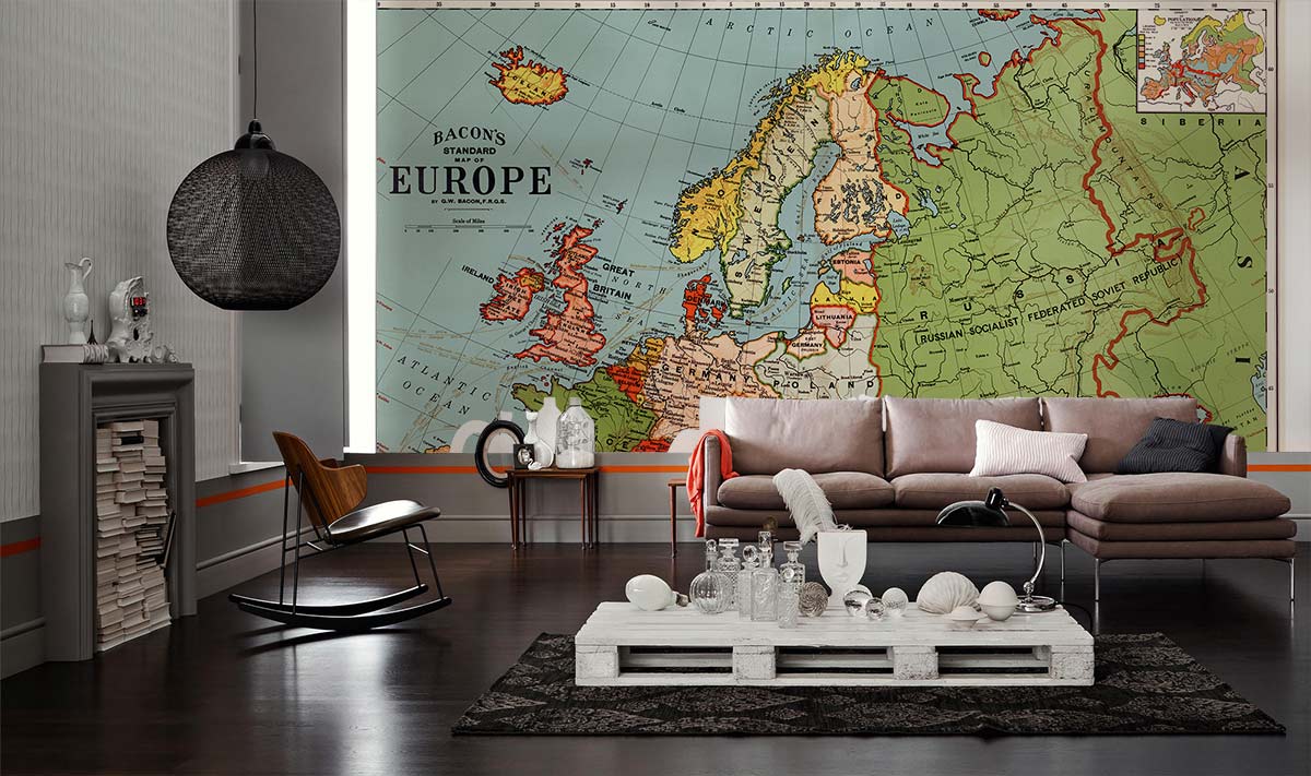 Vintage European Map Mural Wallpaper in stylish room with modern sofa, sleek flooring, and muted decor.
