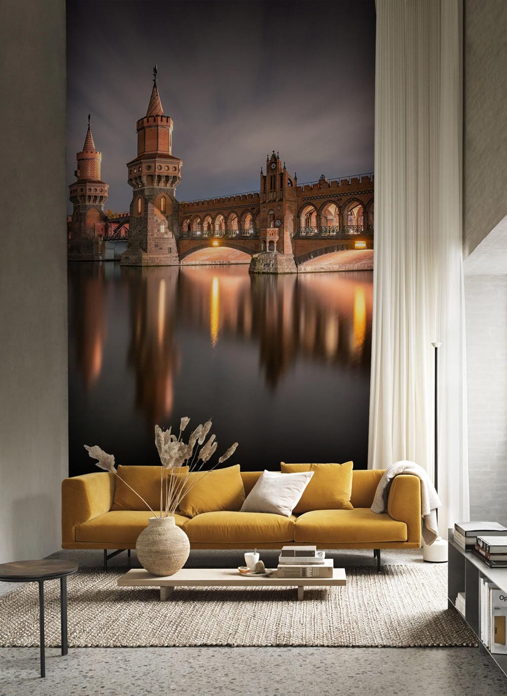 Majestic Berlin Cityscape Mural, modern living room, mustard sofa, textured rug, elegant floor lamp.