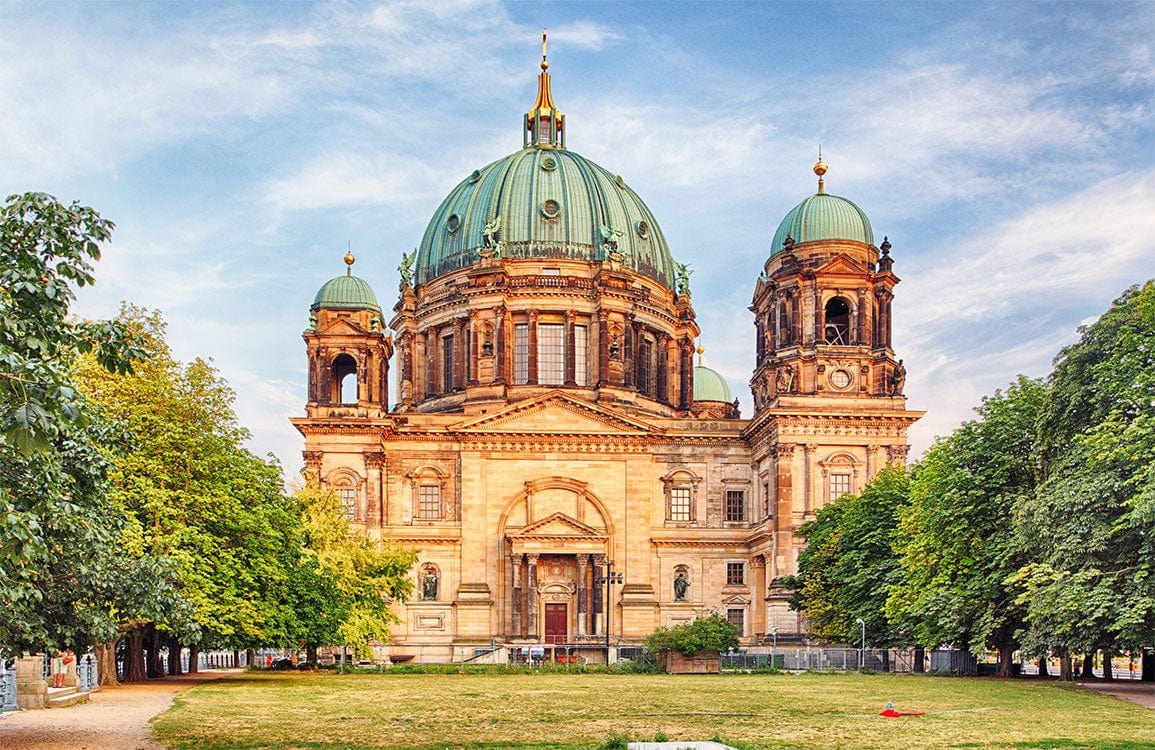 Historic European Cathedral Landscape Mural Wallpaper in Warm Earthy Tones