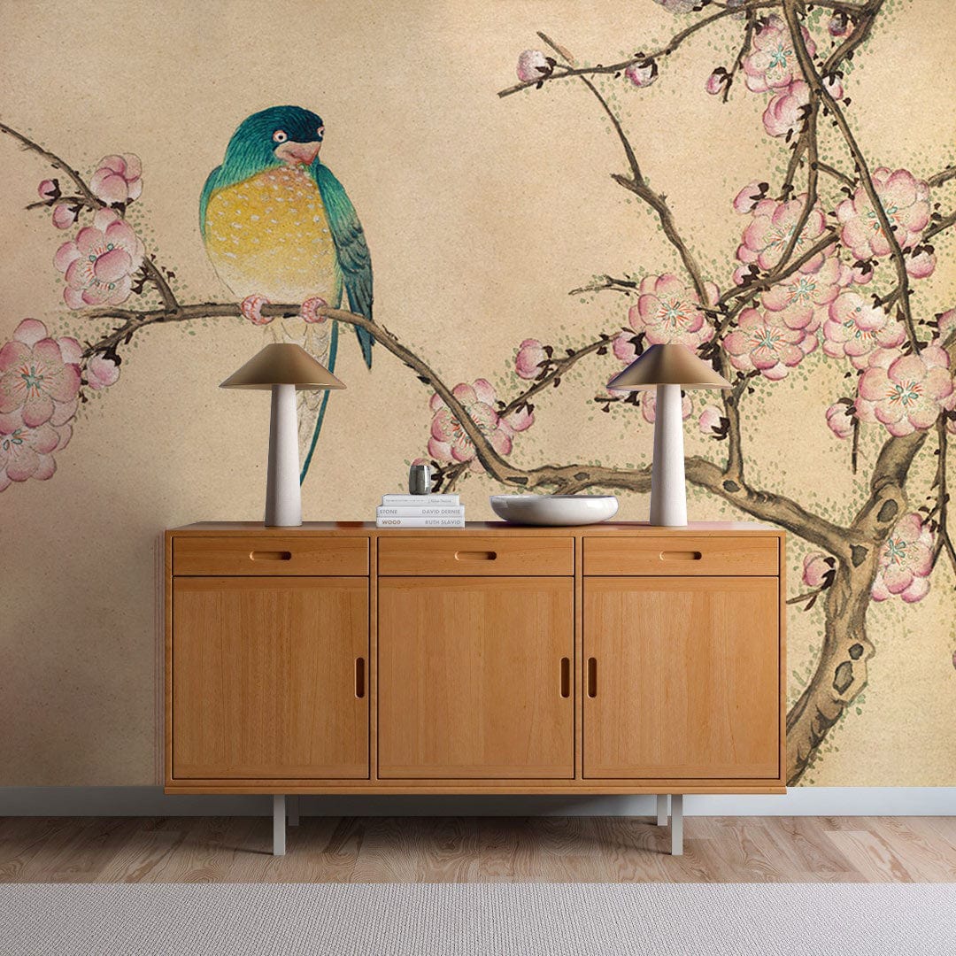 Elegant vintage bird and blossom mural wallpaper complements wooden sideboard, soft grey wall, and wood flooring.