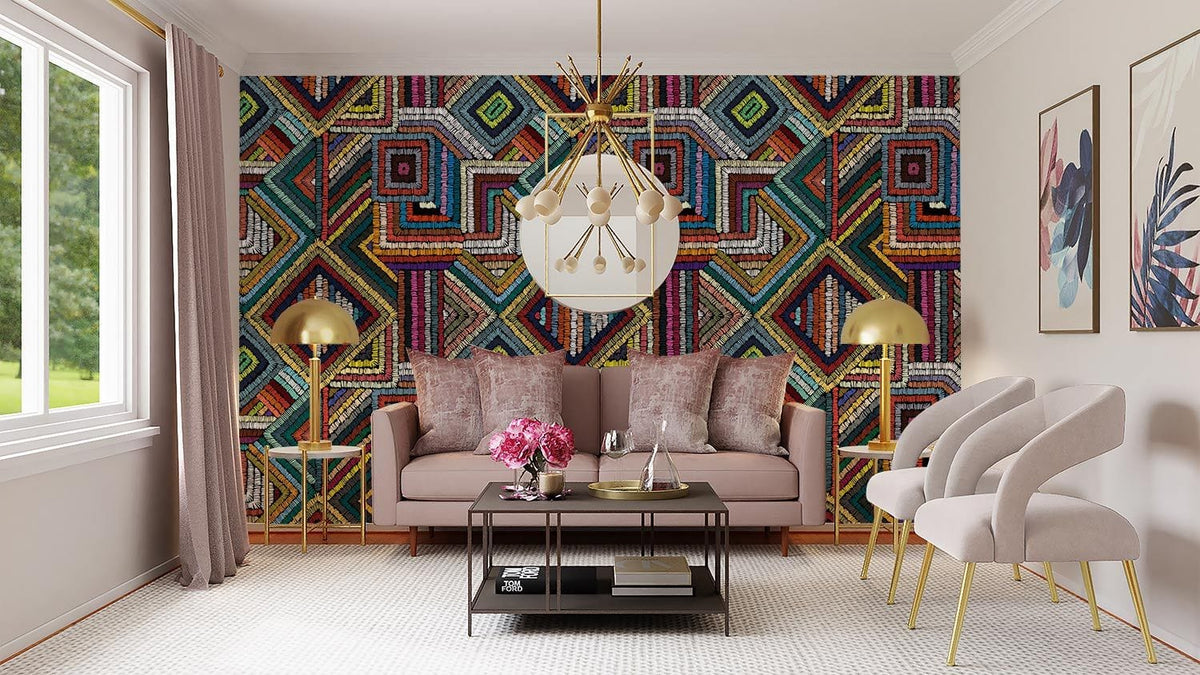 Vibrant geometric tribal wallpaper with multicolour, beige sofa, modern pendant light, and neutral decor.