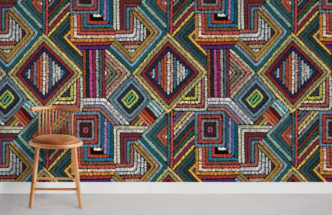 Vibrant geometric tribal pattern wallpaper with wooden chair, ideal for bold interior design and decor.
