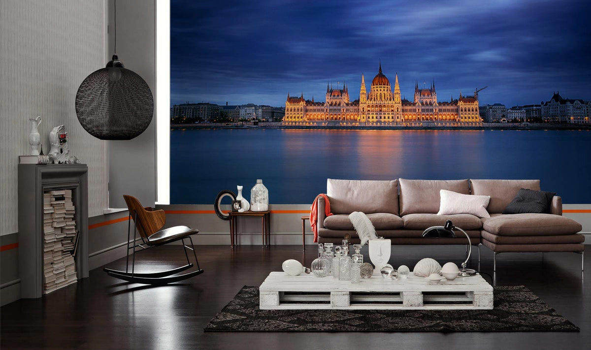 Majestic Nightscape Mural: Illuminated Landmark Wallpaper in lounge with grey sofa, dark wood flooring.