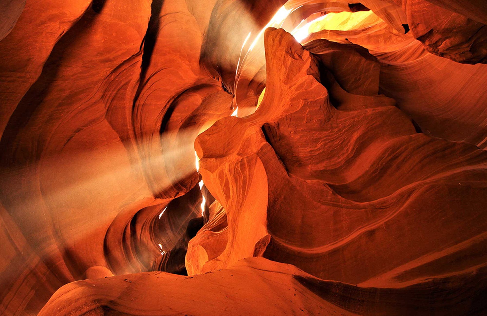 Sunlit Canyon Glow Mural Wallpaper - Warm Earth Tones Scenic Design