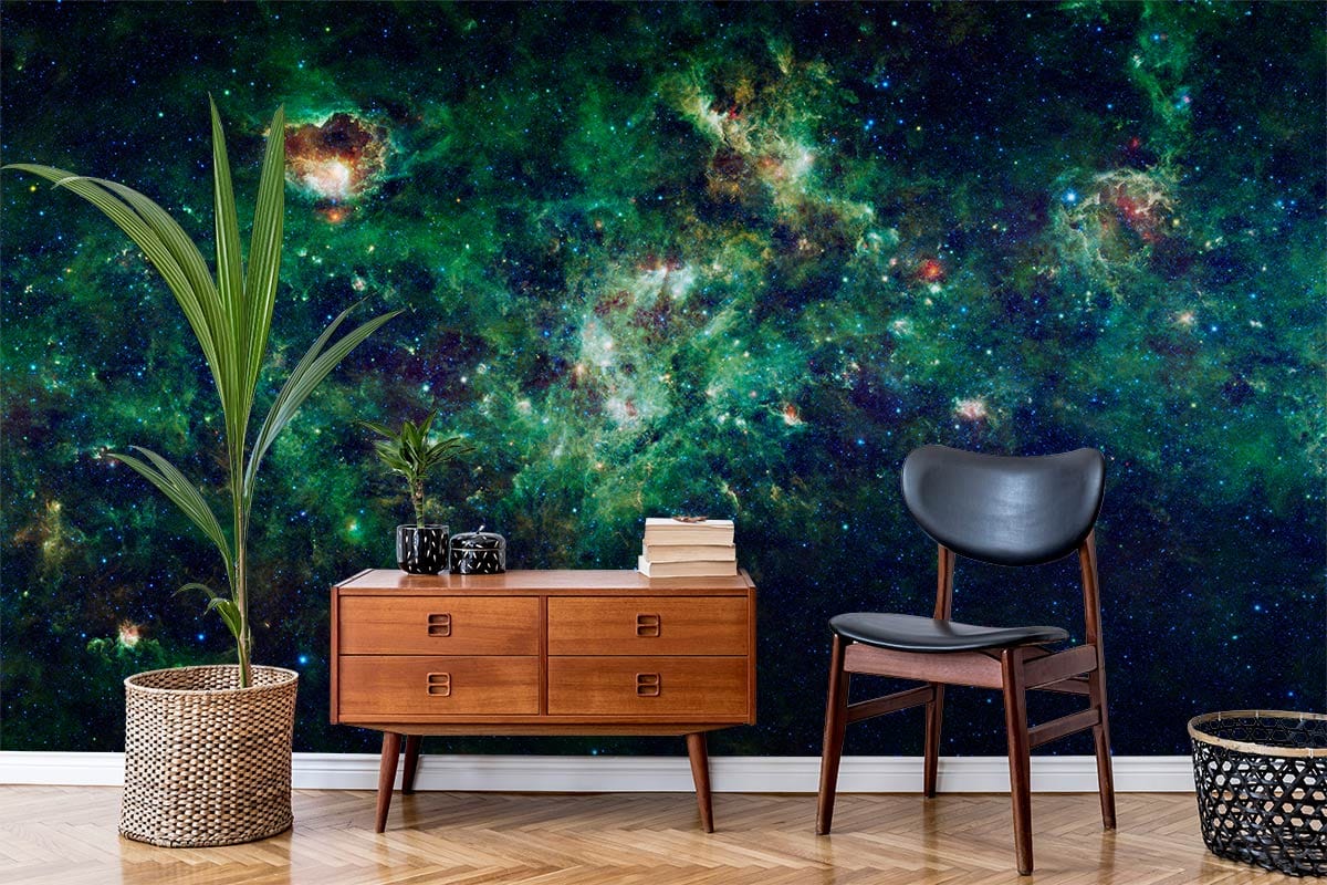 Deep green cosmic galaxy mural in modern living room with mid-century furniture and herringbone flooring.