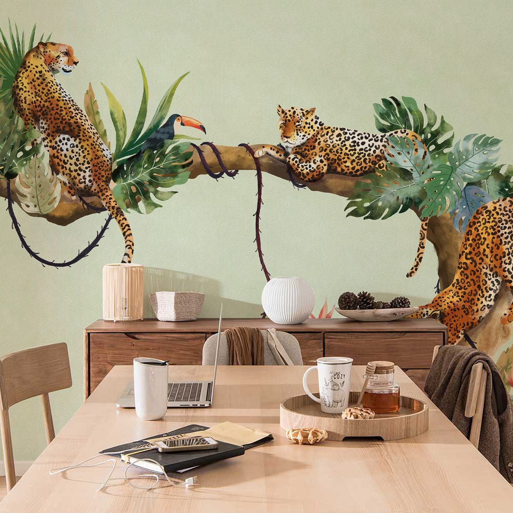 Tropical Jungle Safari mural wallpaper with leopards, wooden dining table, and chairs in modern room.