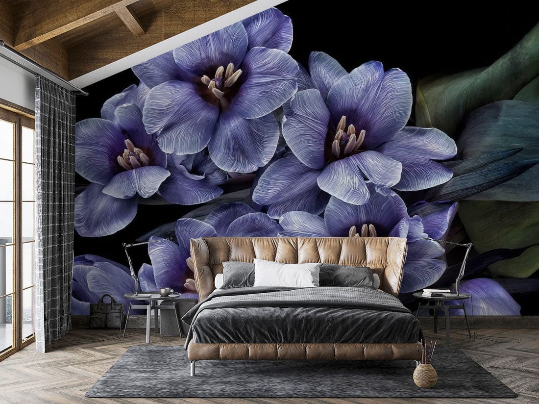 Vintage lilac botanical mural in bedroom, featuring black background and modern grey upholstered bed.