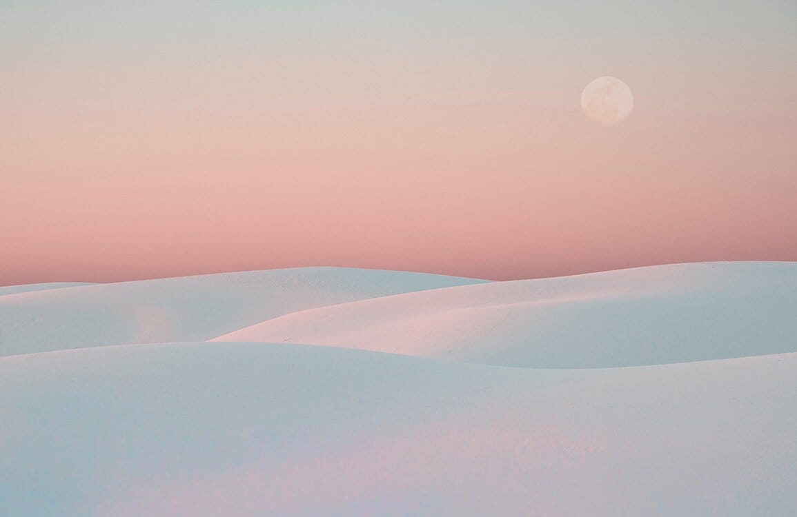 Serene Pastel Sunset Landscape Mural Wallpaper - Soft Pink and Blue